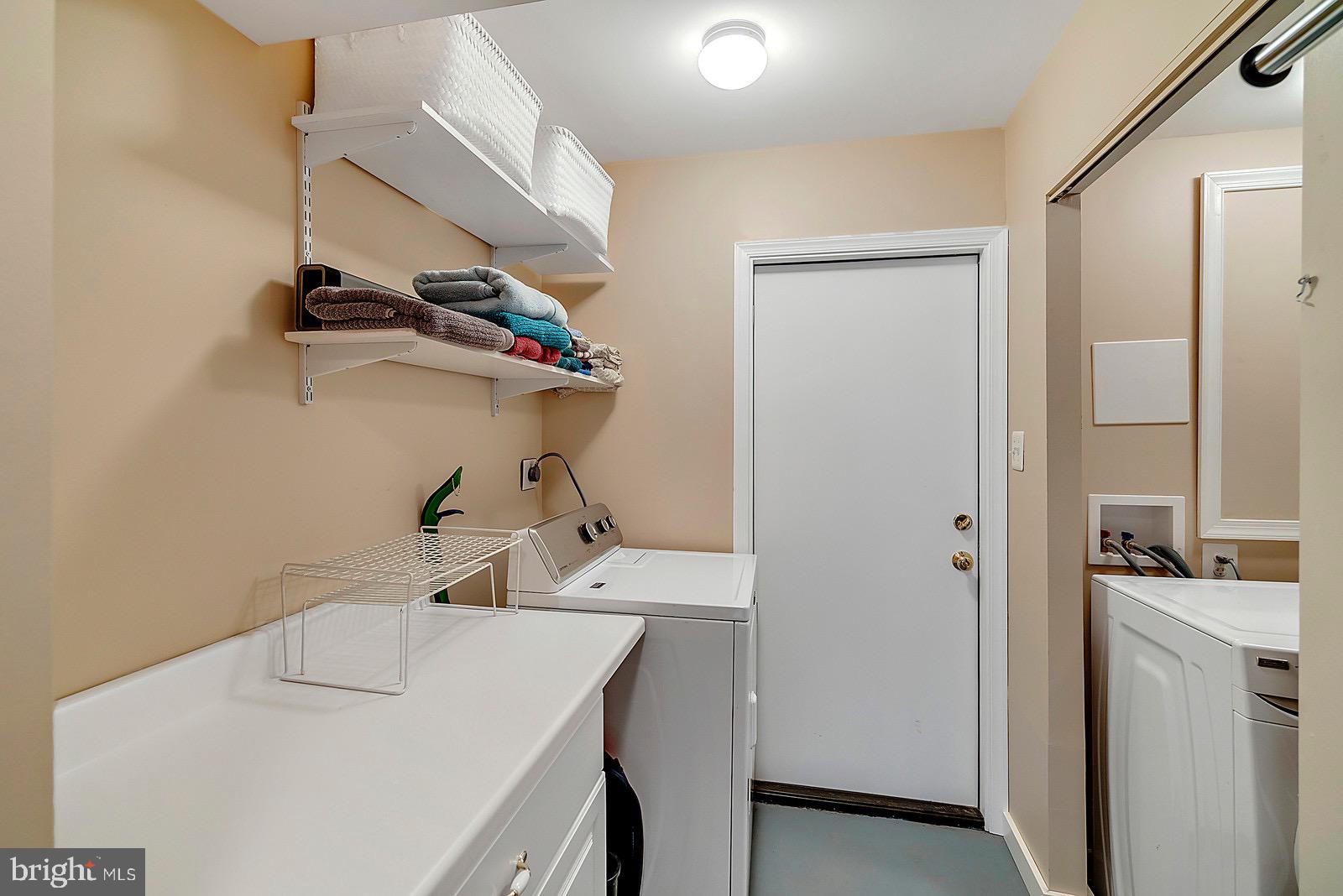 8804 Side Saddle Road Springfield, VA 22152 - Photo 29 of 37 Laundry Room w/Front Loading Washer & Dryer