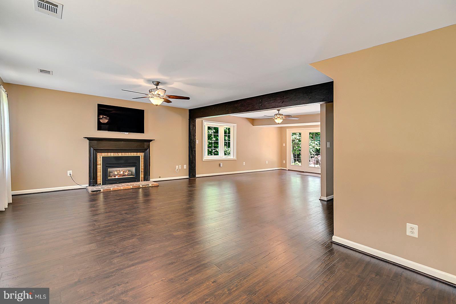 8804 Side Saddle Road Springfield, VA 22152 - Photo 4 of 37 Family Room with Gas Fireplace and TV Mount
