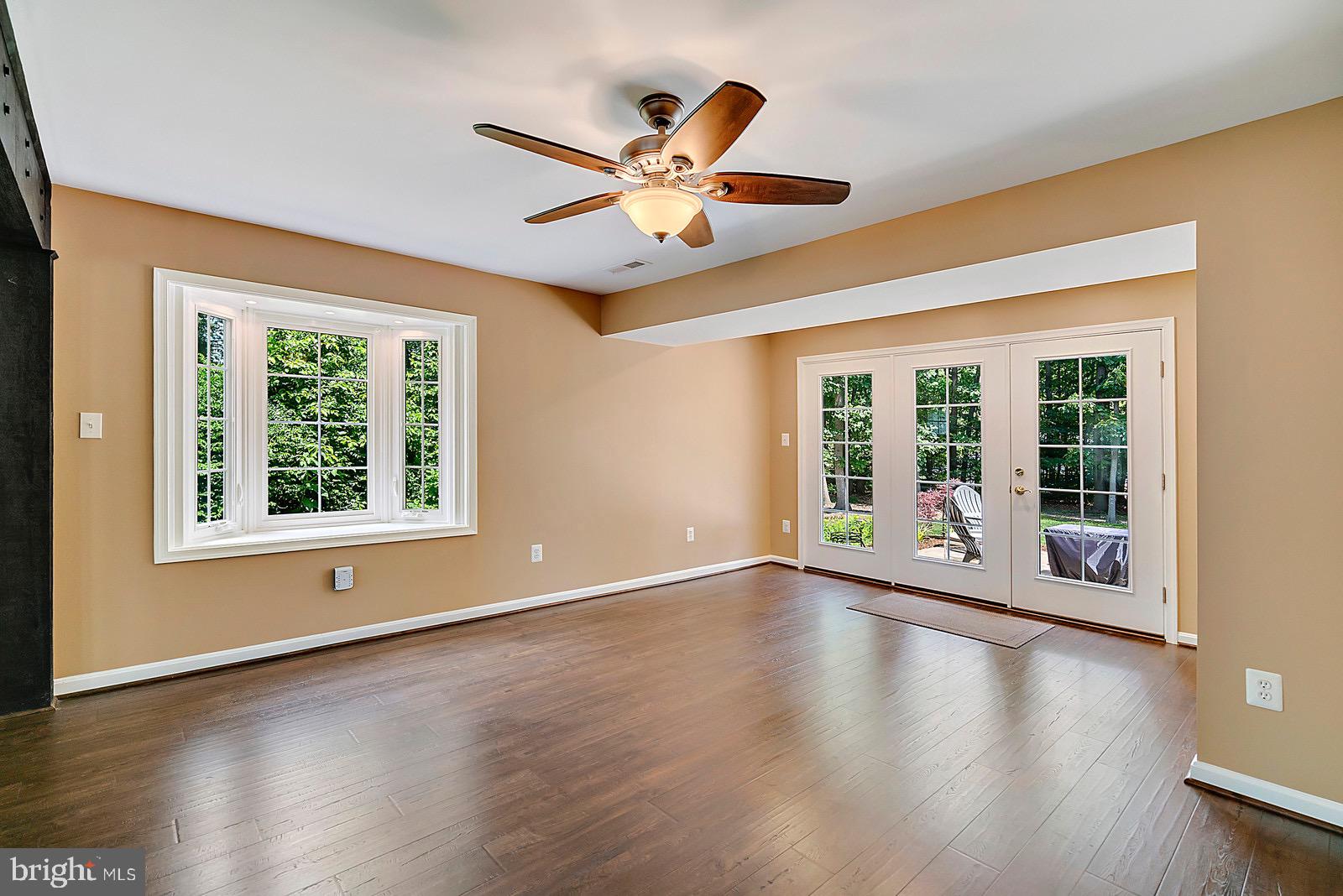 8804 Side Saddle Road Springfield, VA 22152 - Photo 6 of 37 Great Room w/Bay Windows and French Doors to Patio