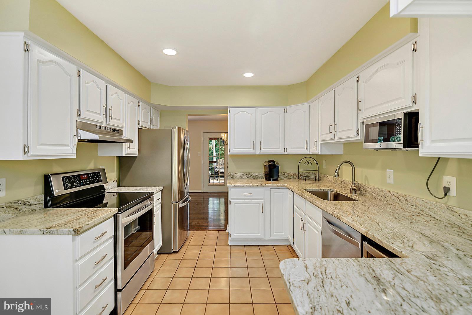 8804 Side Saddle Road Springfield, VA 22152 - Photo 9 of 37 Walk-In Kitchen w/Stainless Steel Appliances