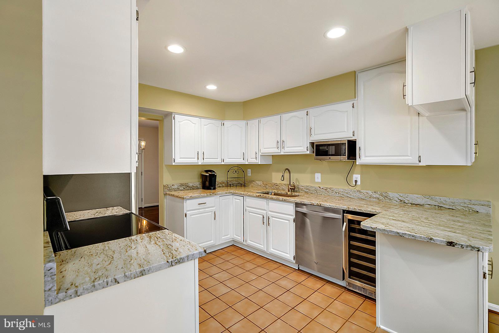 8804 Side Saddle Road Springfield, VA 22152 - Photo 10 of 37 Kitchen w/Refinished Cabinets & Fully Tiled Floor