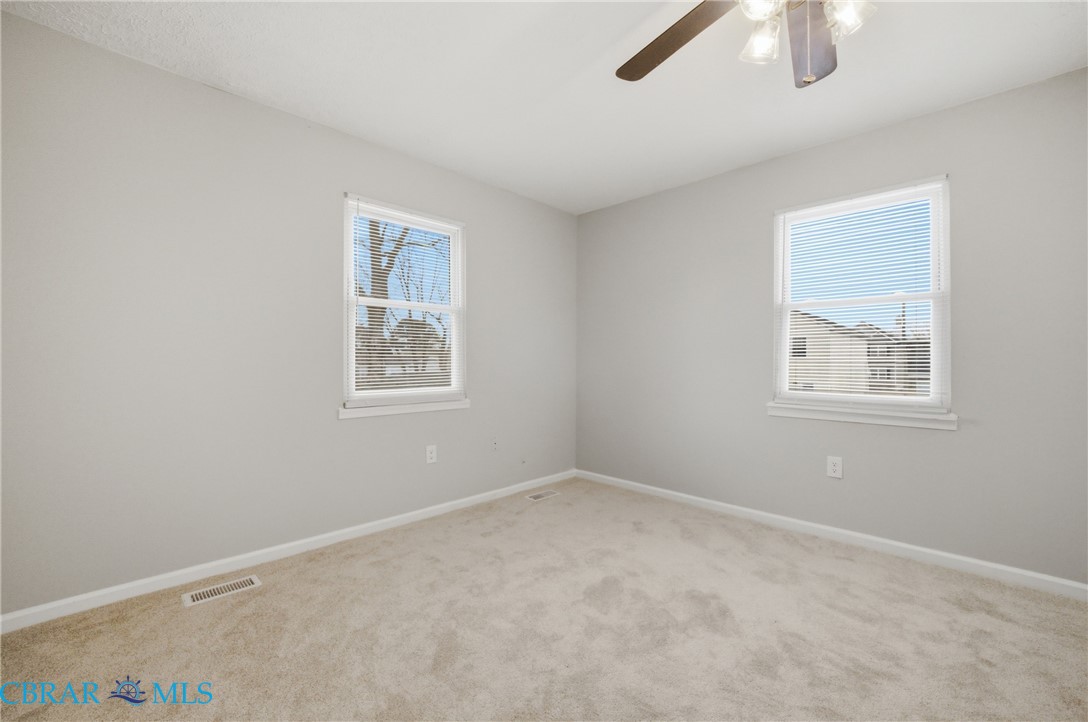 733 Spruce Street Hampton, VA 23661 - Photo 14 of 29 Spare room with carpet floors and a ceiling fan
