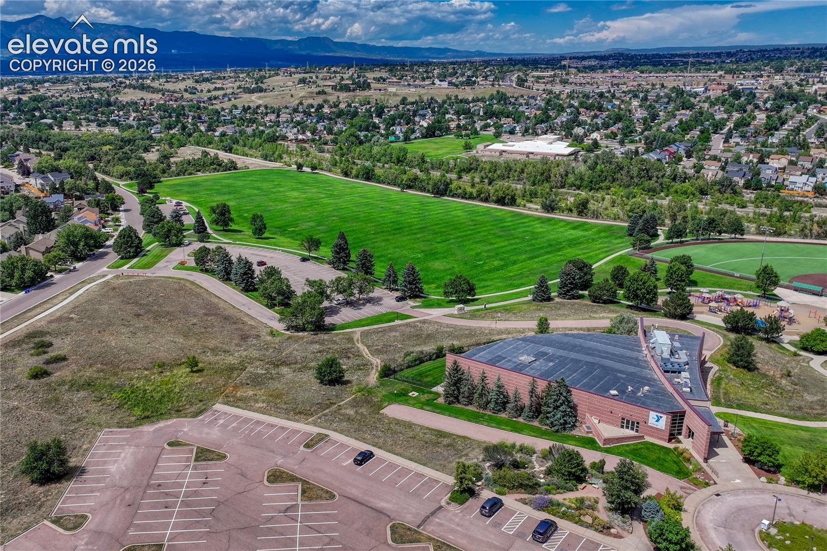 4147 Diamond Ridge View Colorado Springs, CO 80918 - Photo 35 of 42 Step outside your door to find the massive, lush green fields and parklands of Cottonwood Creek Park and the YMCA, offering endless recreational activities
