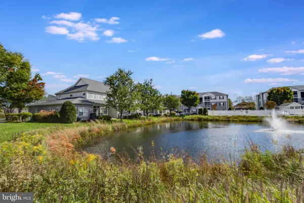 a view of a lake with houses