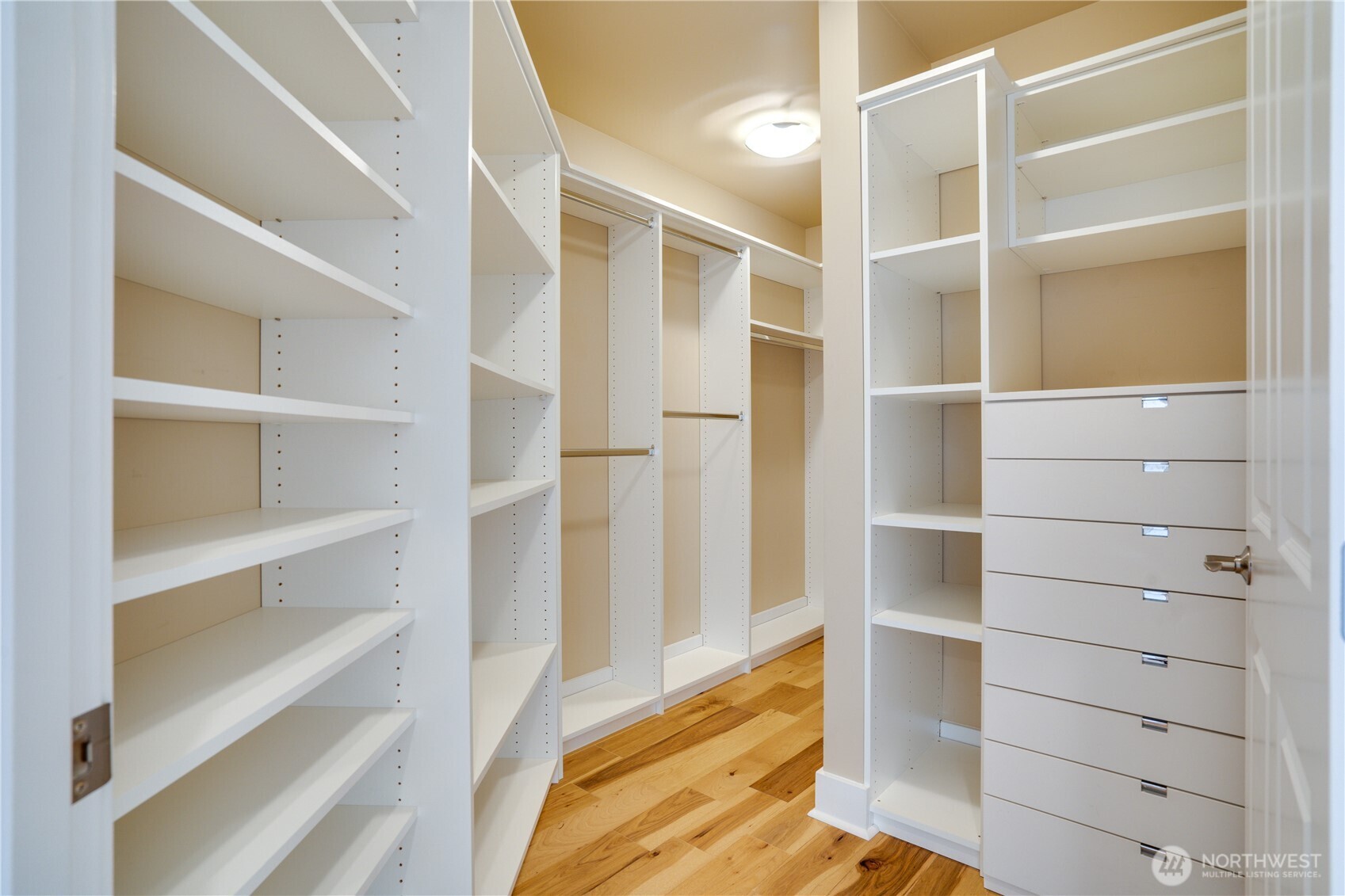 708 Market Street, Unit 705 Tacoma, WA 98402 - Photo 11 of 38 a view of walk in closet with empty racks