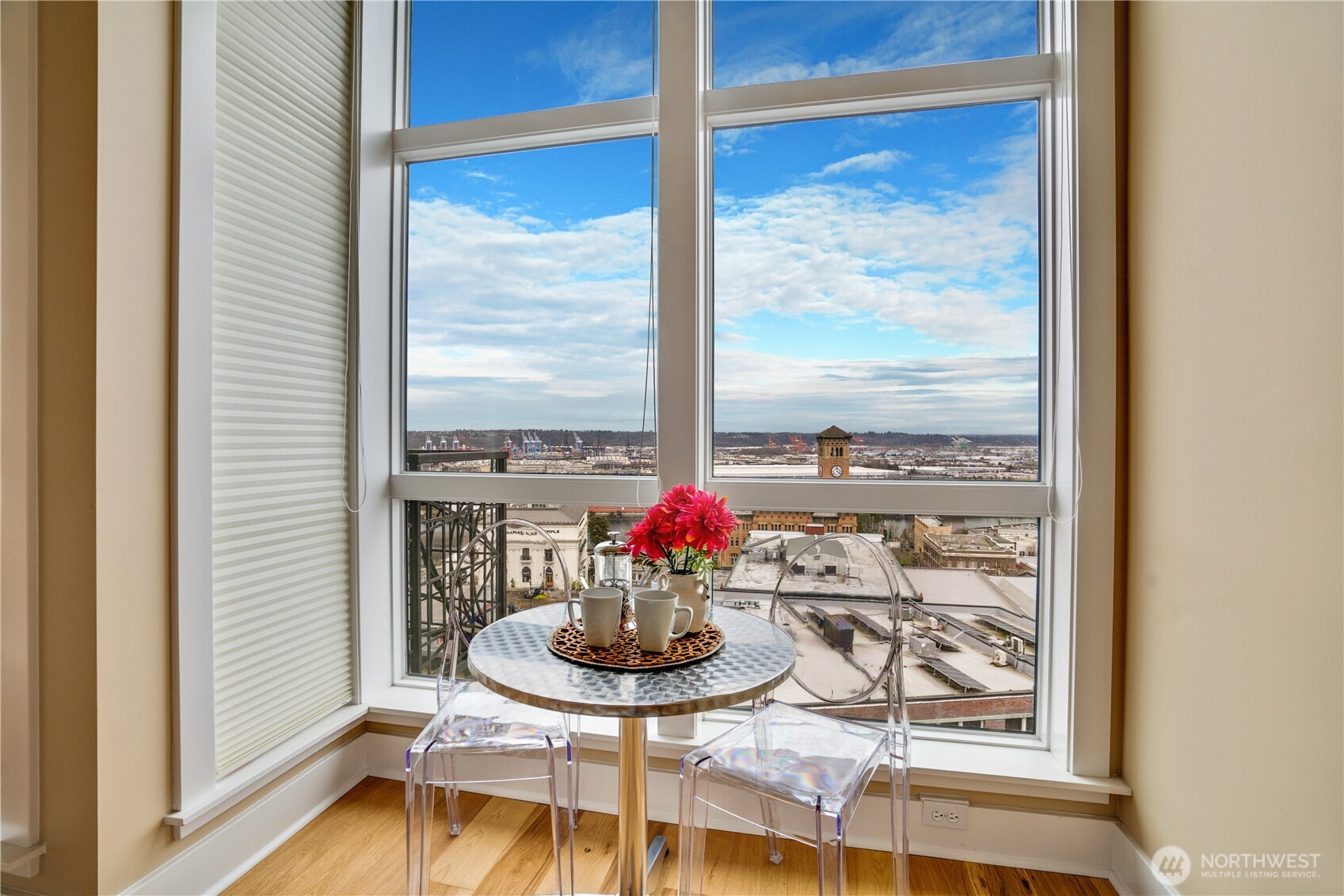 708 Market Street, Unit 705 Tacoma, WA 98402 - Photo 14 of 38 a view of a dining room with furniture window and outside view
