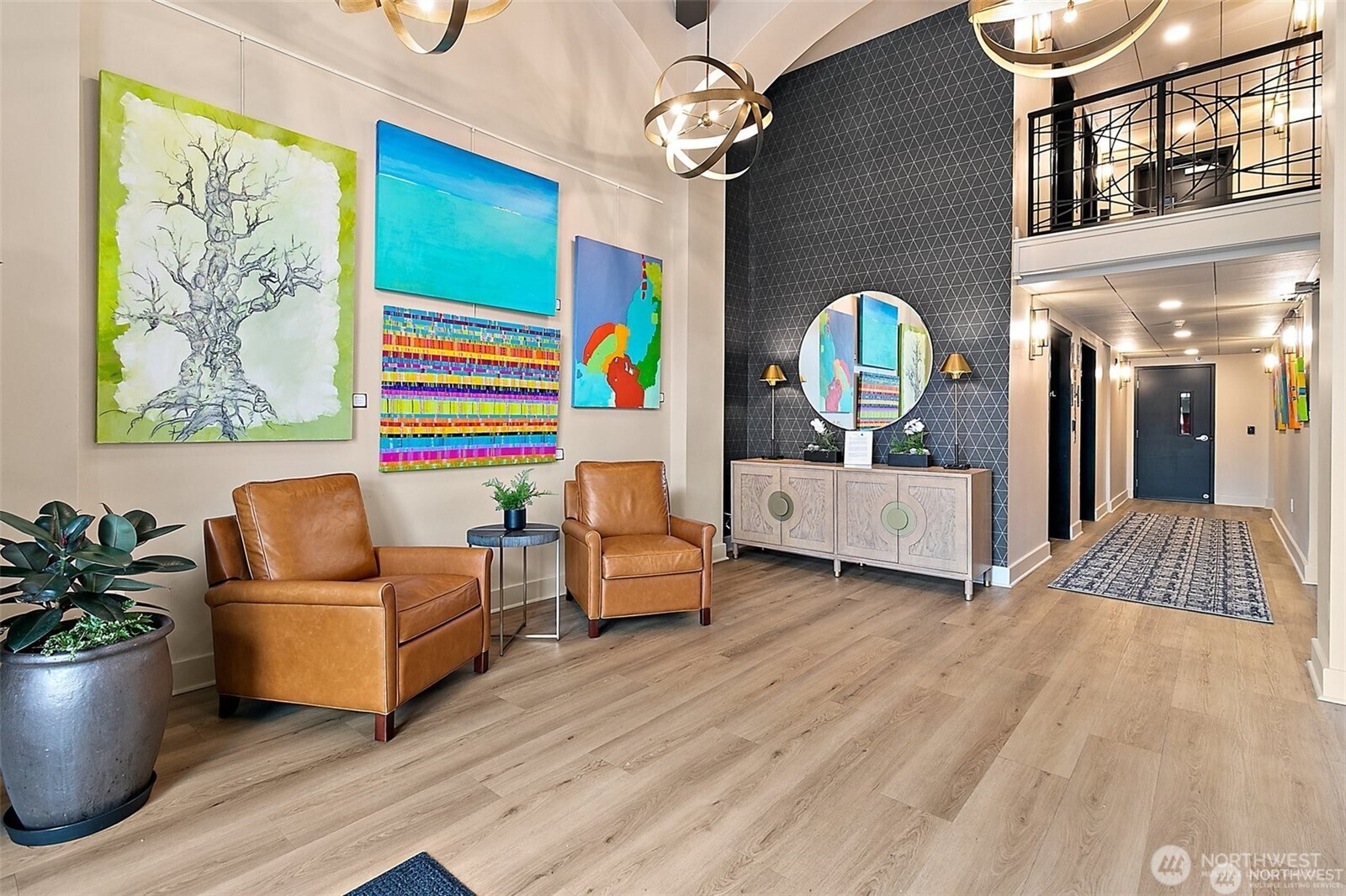 708 Market Street, Unit 705 Tacoma, WA 98402 - Photo 32 of 38 a living room with furniture and a wooden floor