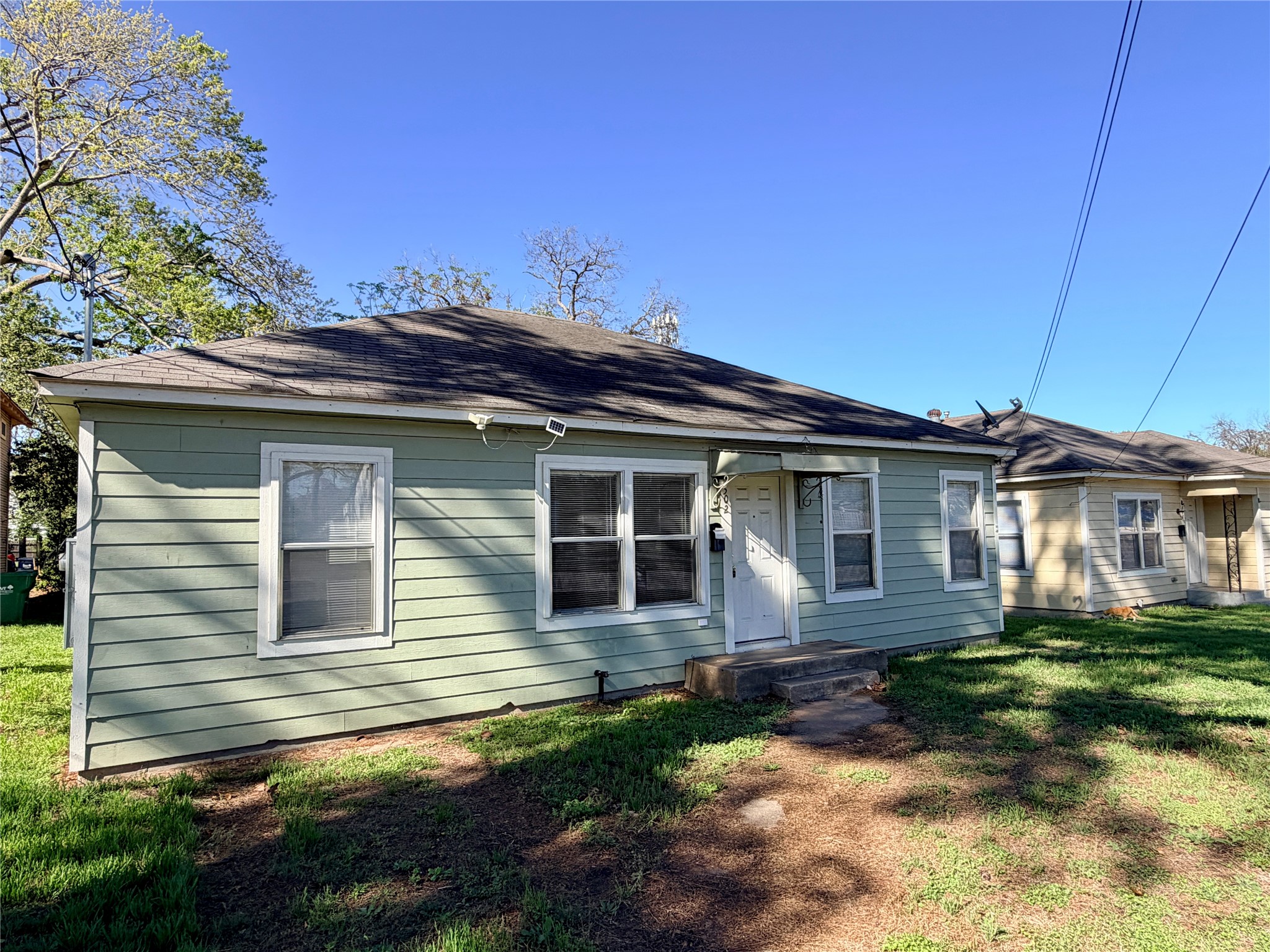 502 West Third Street Brenham, TX 77833 - Photo 2 of 10 a view of a house with a yard