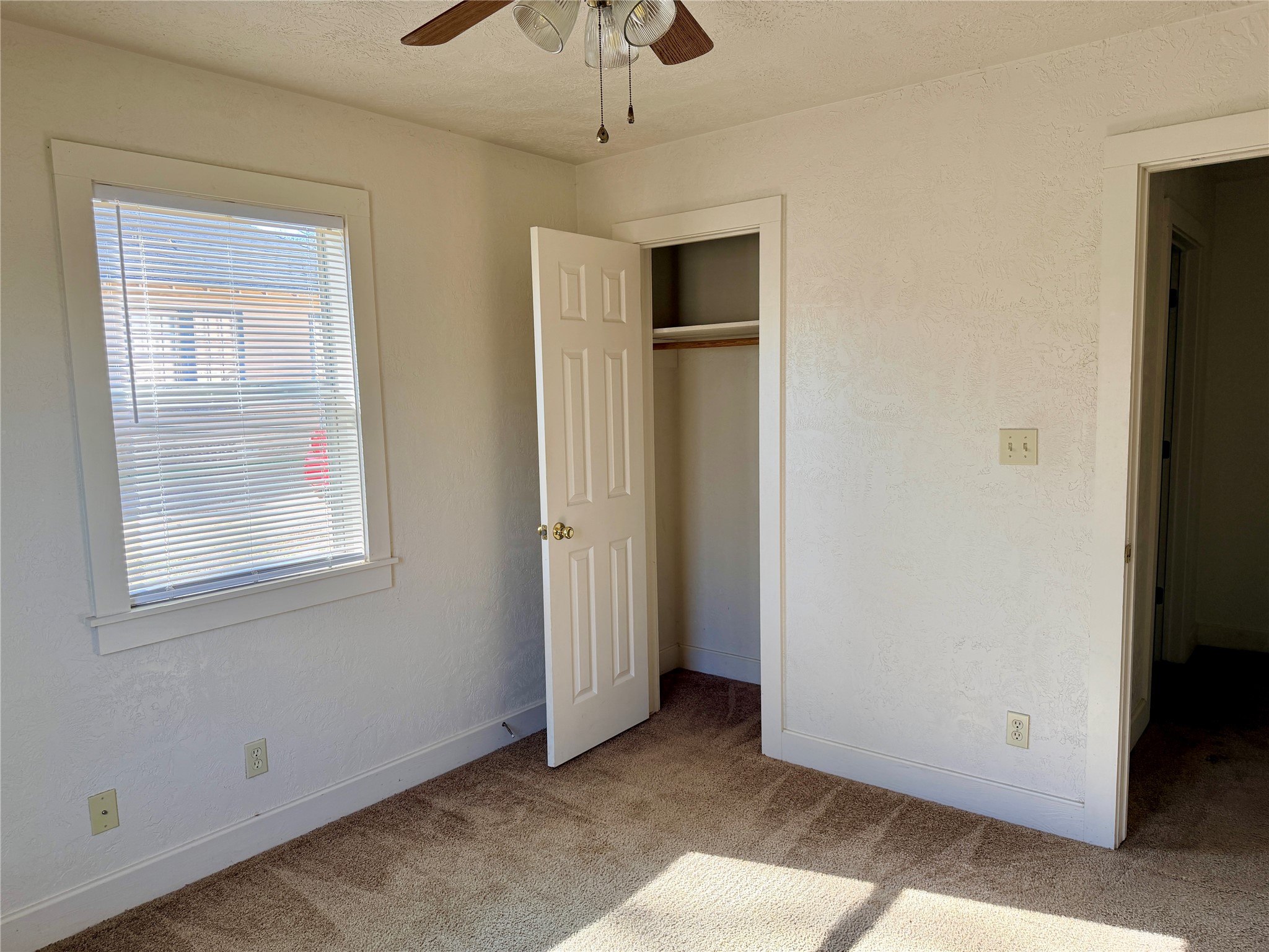 502 West Third Street Brenham, TX 77833 - Photo 6 of 10 a view of an empty room with closet and a window