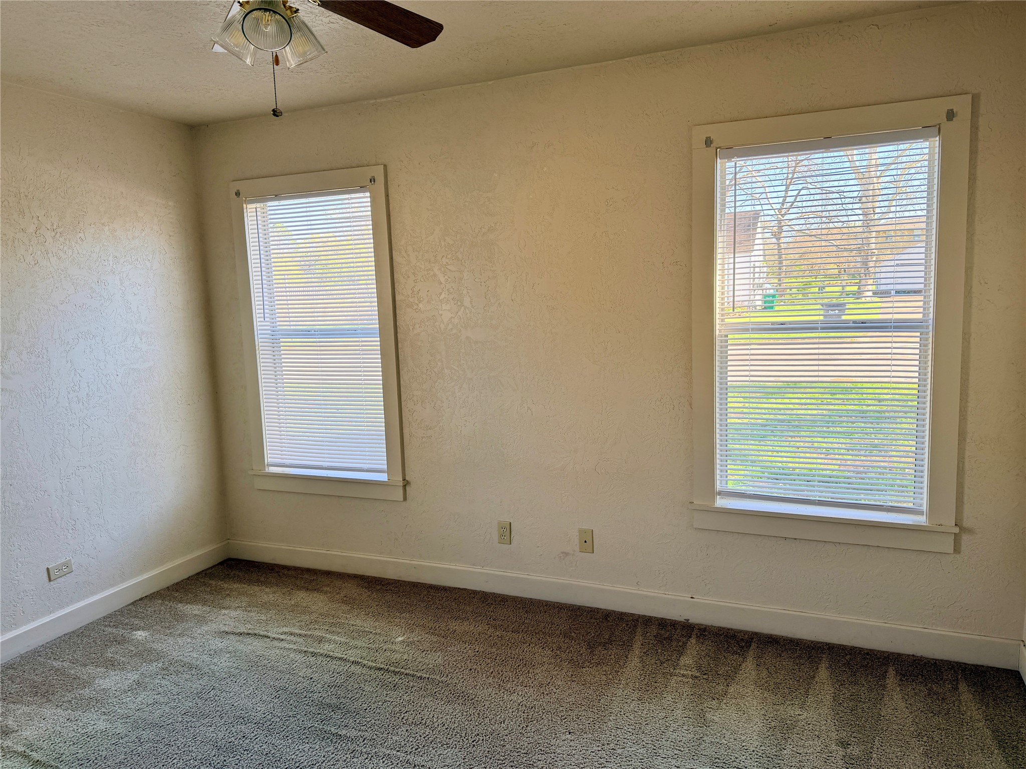 502 West Third Street Brenham, TX 77833 - Photo 7 of 10 a view of an empty room with a window