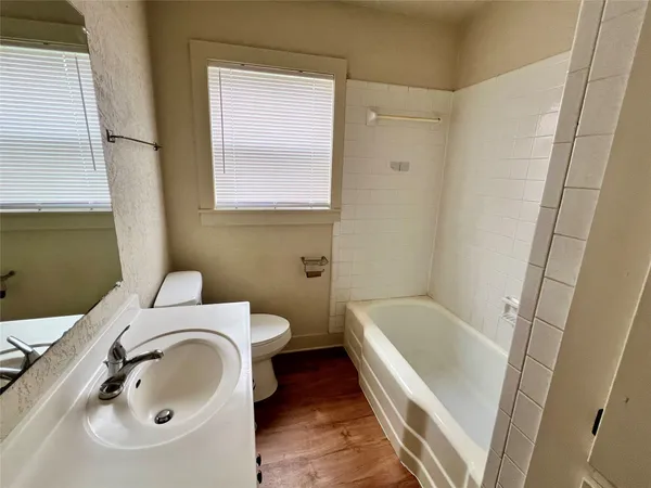 a bathroom with a sink and a bathtub