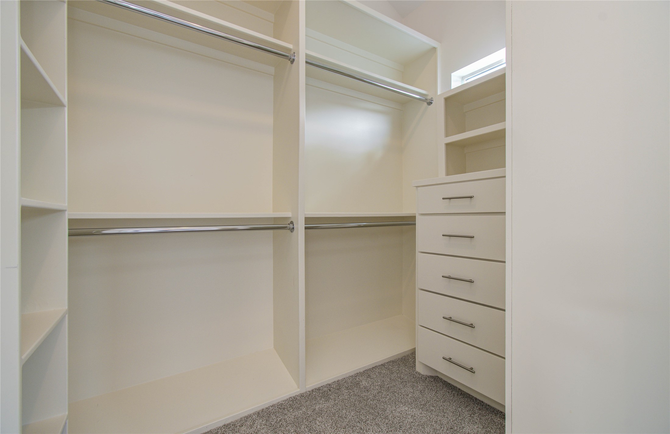 4311 Marina Street Houston, TX 77007 - Photo 33 of 42 a view of walk in closet with empty racks