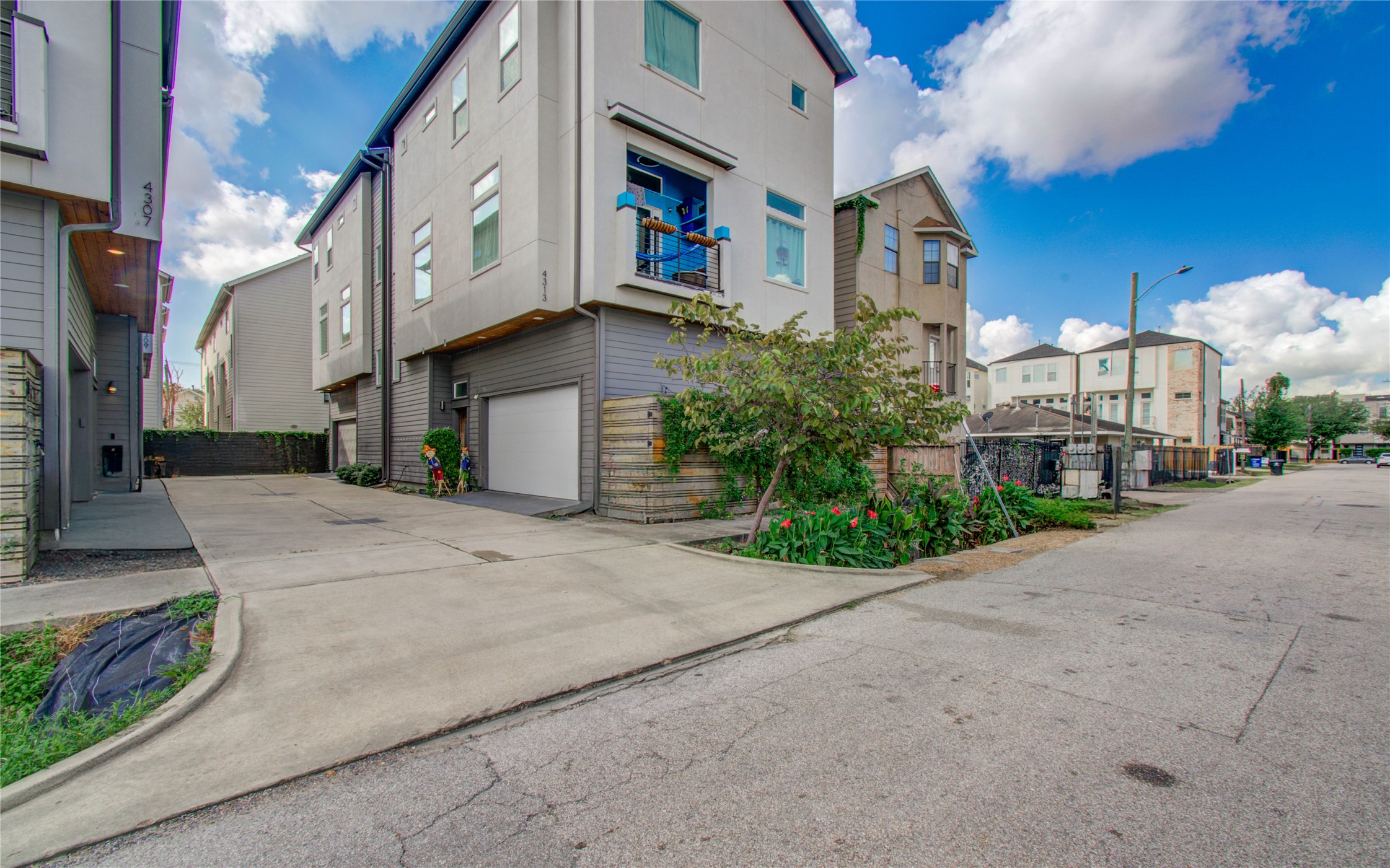 4311 Marina Street Houston, TX 77007 - Photo 6 of 42 a view of a street with cars on both side of the road