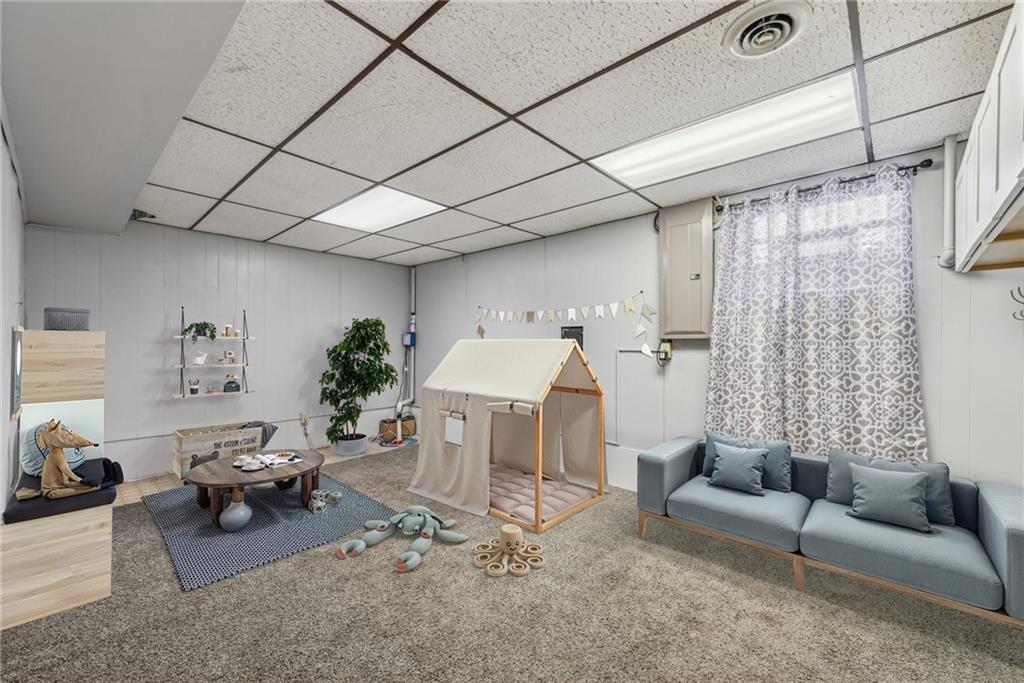 106 Cameron Drive Irwin, PA 15642 - Photo 21 of 27 a living room with furniture and a couch