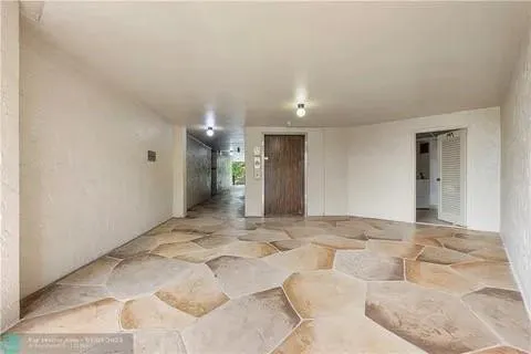 a view of a livingroom with a furniture