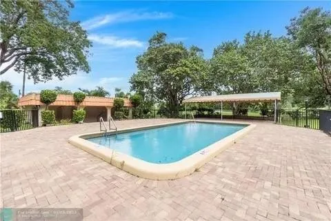 a view of a park with tree s