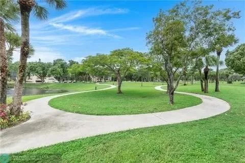 a view of a garden with trees