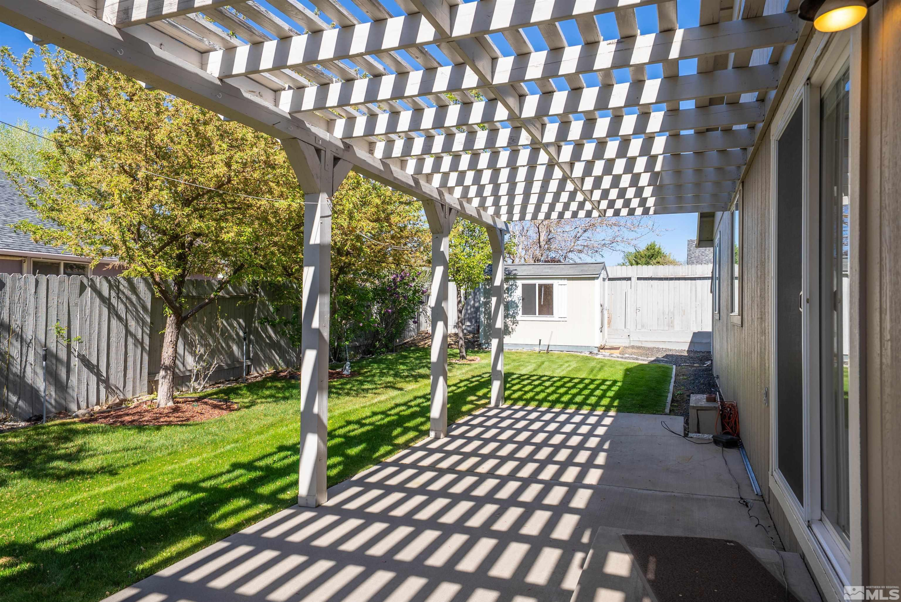 980 Ridgeview Drive Carson City, NV 89705 - Photo 16 of 18 a view of a porch with a bench in the patio