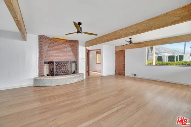 a spacious bathroom with a bathtub and mirror