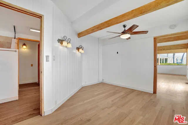 a view of residential houses with a city view