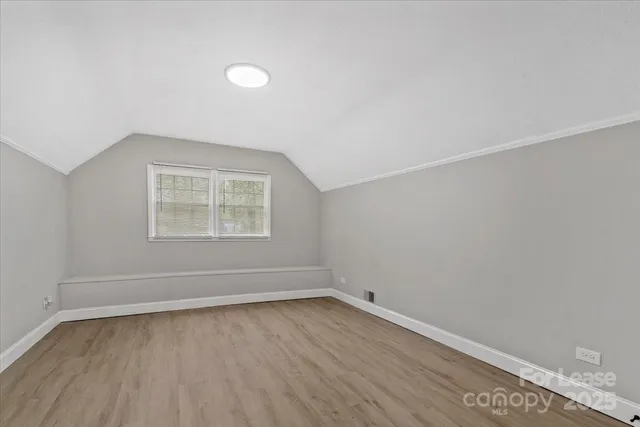 an empty room with a workspace