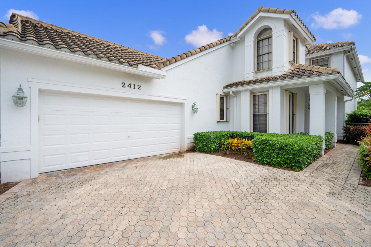 2412 Northwest 63rd Street Boca Raton, FL 33496 - Photo 2 of 53 Front-2.jpg