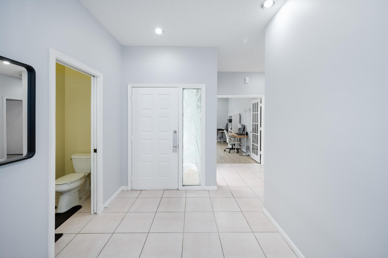 2412 Northwest 63rd Street Boca Raton, FL 33496 - Photo 4 of 53 Foyer.jpg