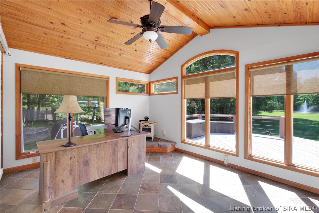 4420 Fox Road Charlestown, IN 47111 - Photo 7 of 94 Sun Room overlooking the above ground pool and pond