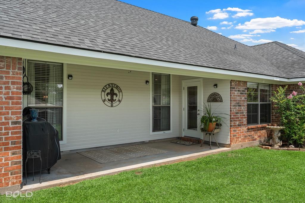 116 Augusta Avenue Benton, LA 71006 - Photo 31 of 38 a front view of a house with garden