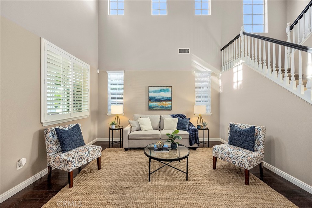 14280 Brant Court Eastvale, CA 92880 - Photo 7 of 47 a living room with furniture and a large window