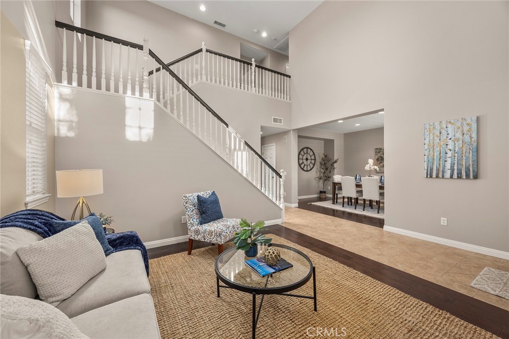 14280 Brant Court Eastvale, CA 92880 - Photo 9 of 47 a living room with furniture and a potted plant