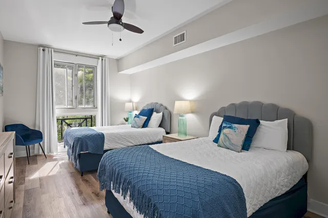 a bedroom with bed and window