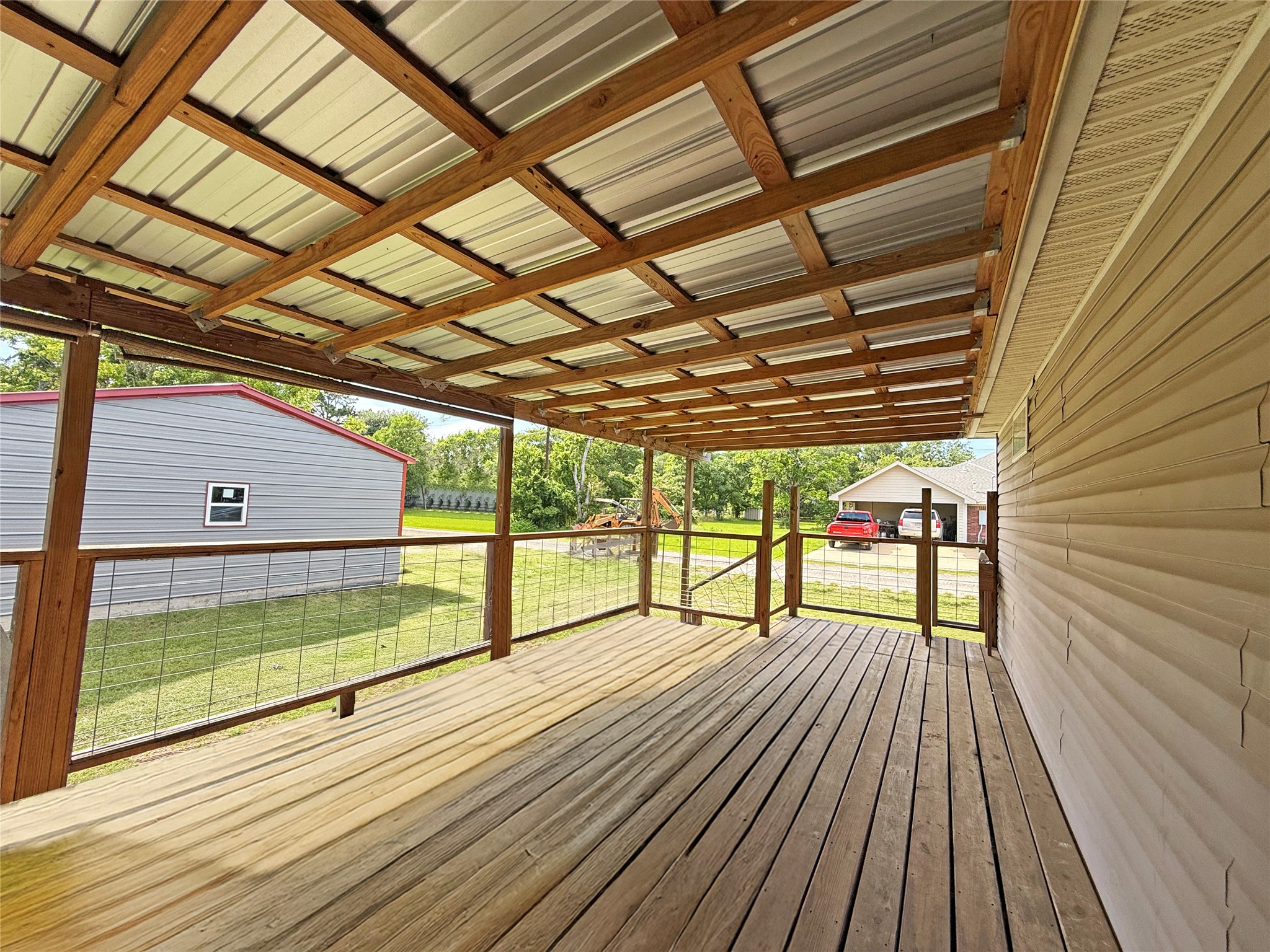 845 Caldwell Street Lexington, TX 78947 - Photo 22 of 39 Deck with a yard