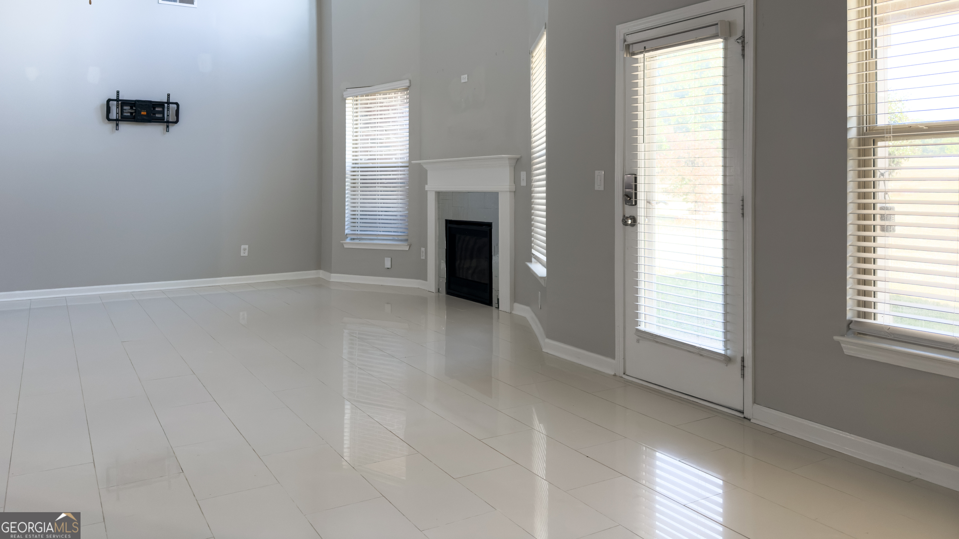 3368 Alhambra Circle Hampton, GA 30228 - Photo 11 of 43 a view of an empty room with a window