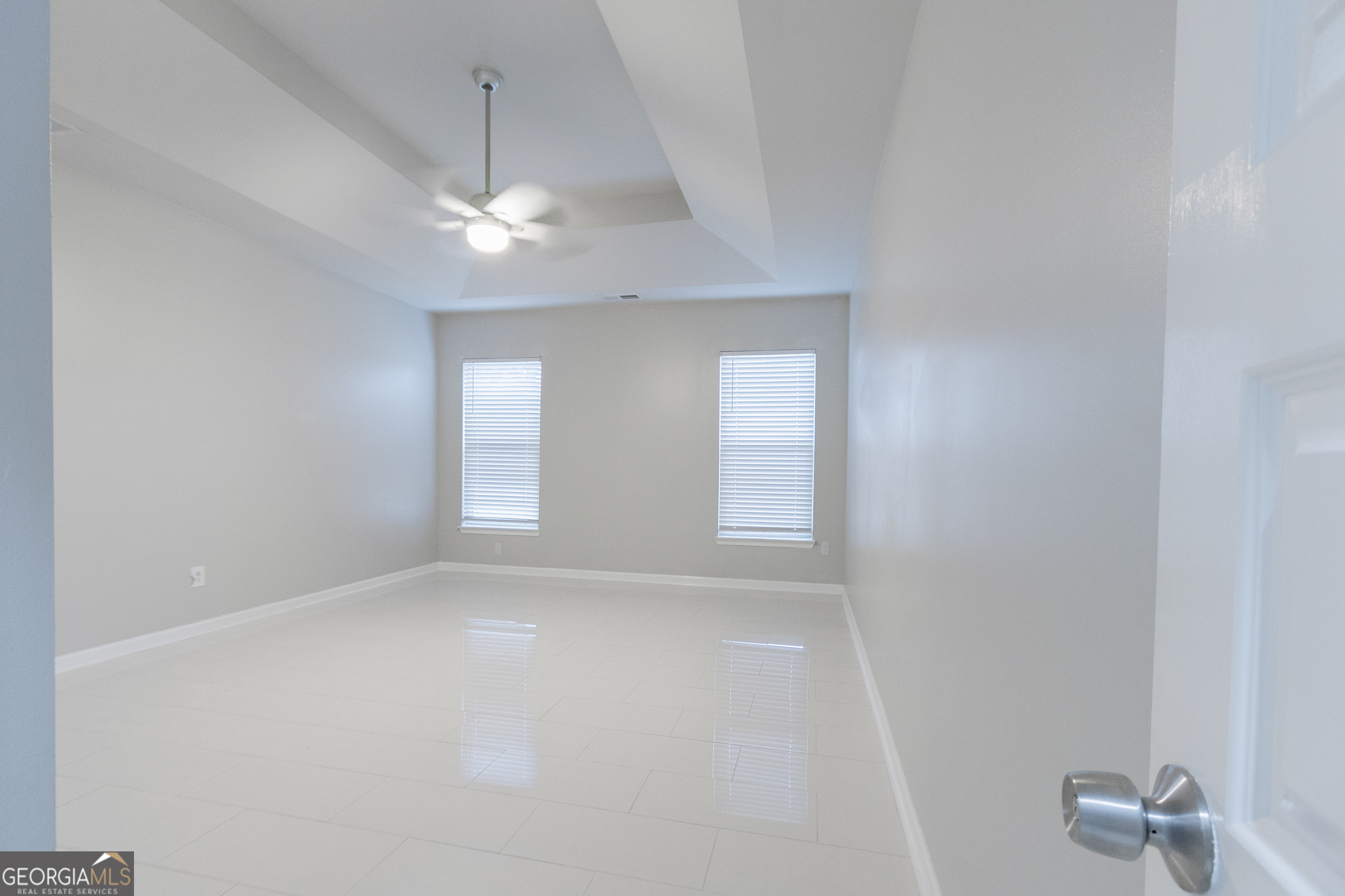 3368 Alhambra Circle Hampton, GA 30228 - Photo 13 of 43 a view of an empty room with a window