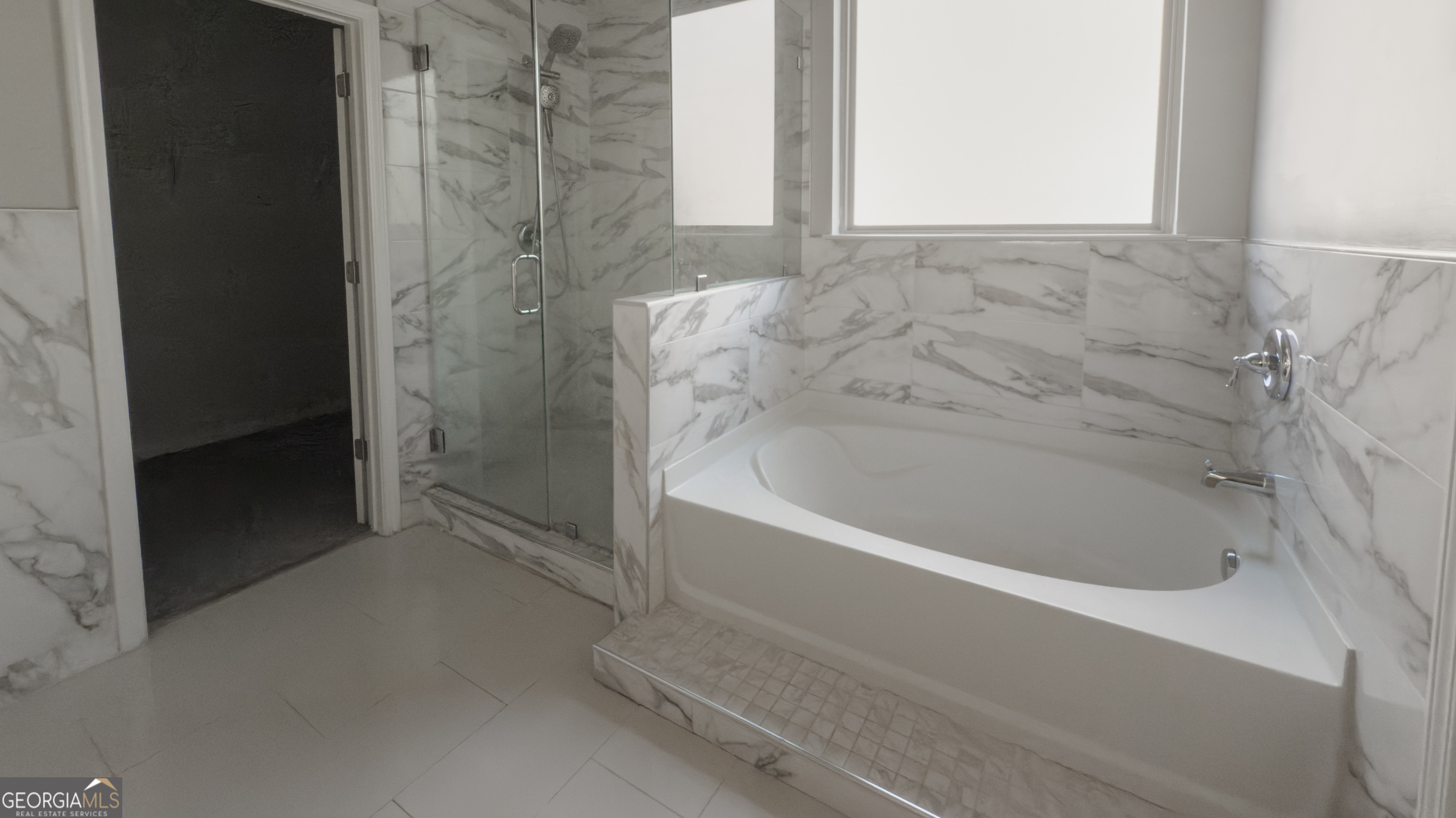 3368 Alhambra Circle Hampton, GA 30228 - Photo 20 of 43 a bathroom with a bathtub