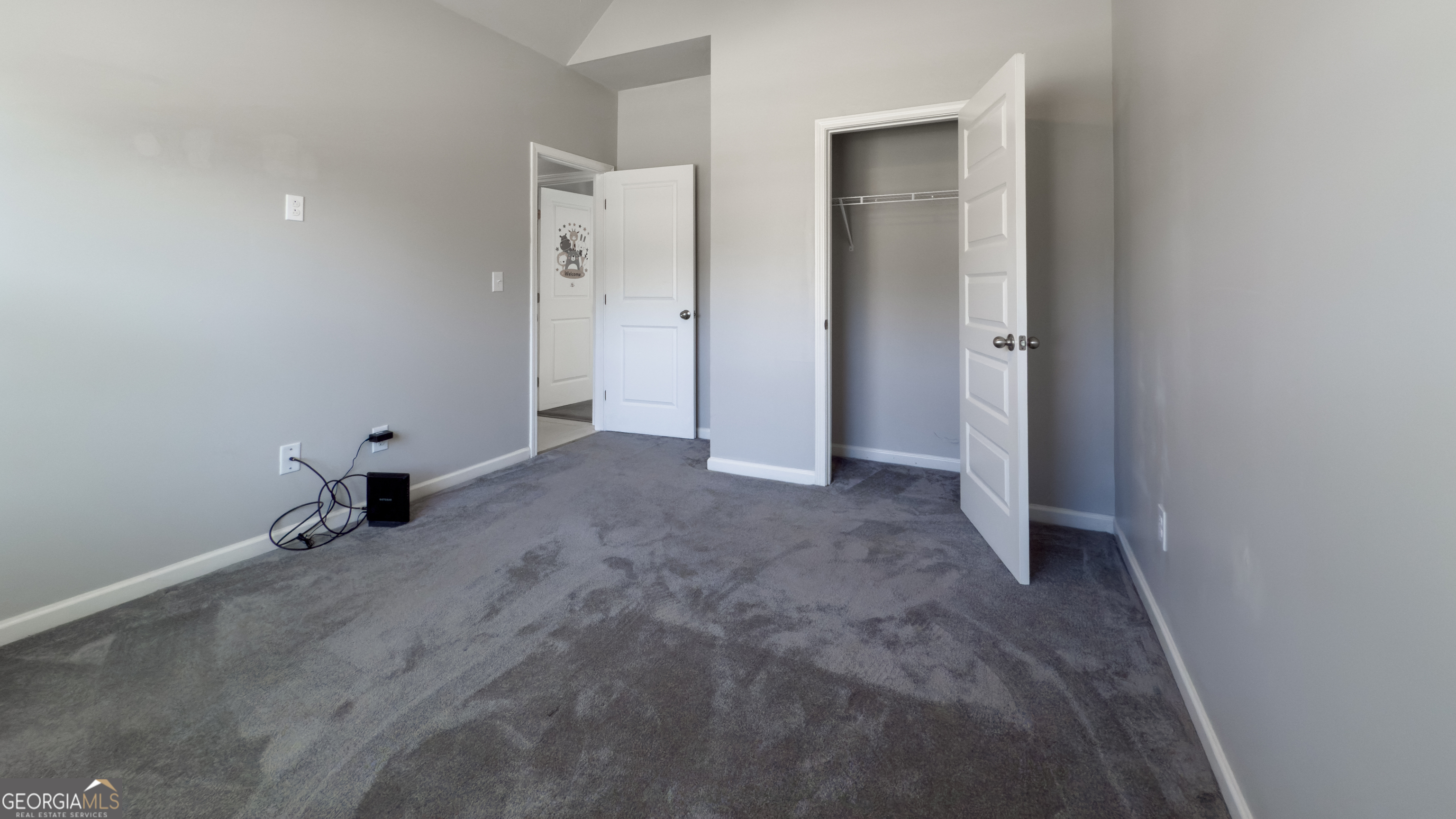 3368 Alhambra Circle Hampton, GA 30228 - Photo 24 of 43 a view of an empty room with closet area