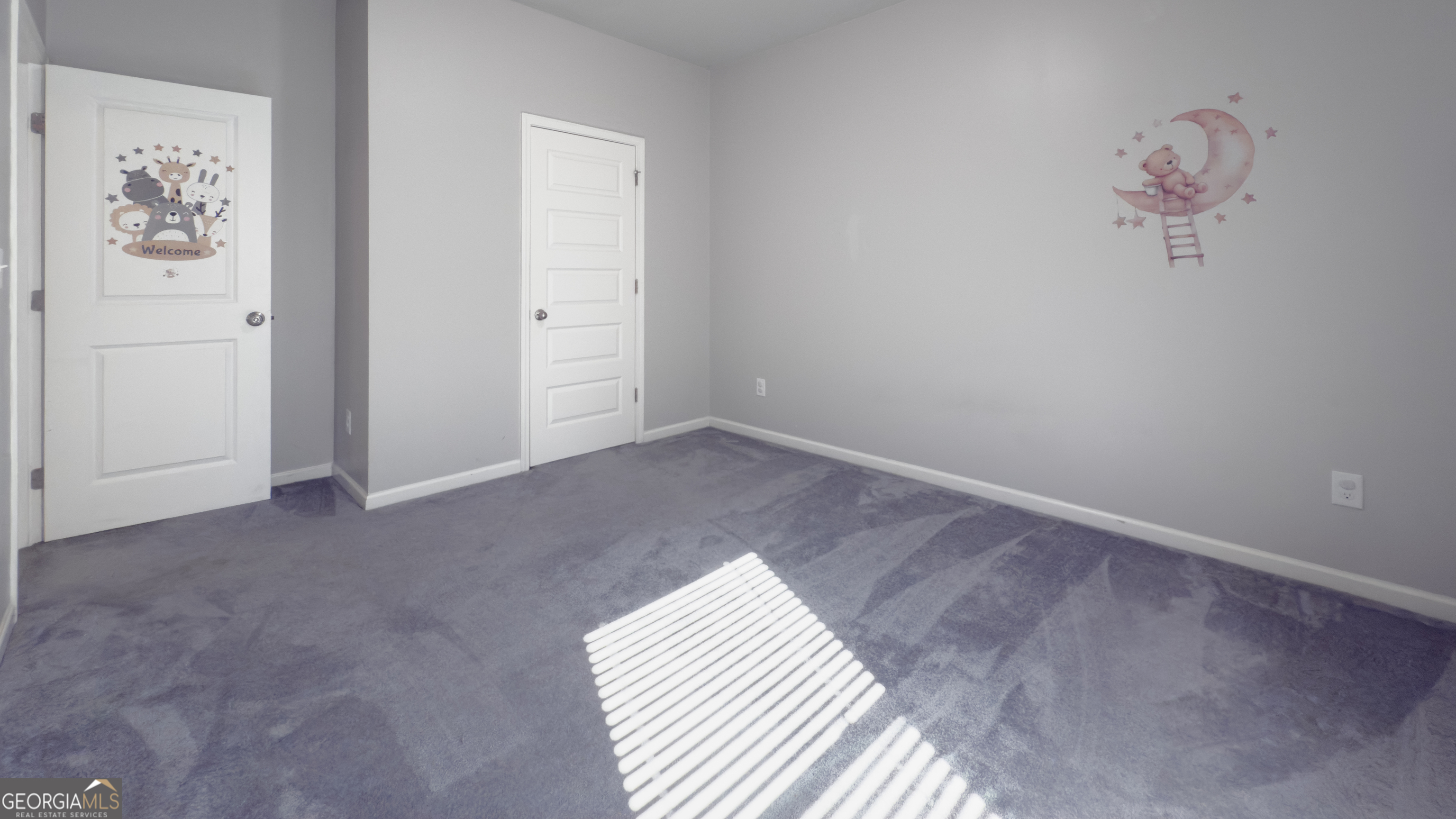 3368 Alhambra Circle Hampton, GA 30228 - Photo 26 of 43 an empty room with windows