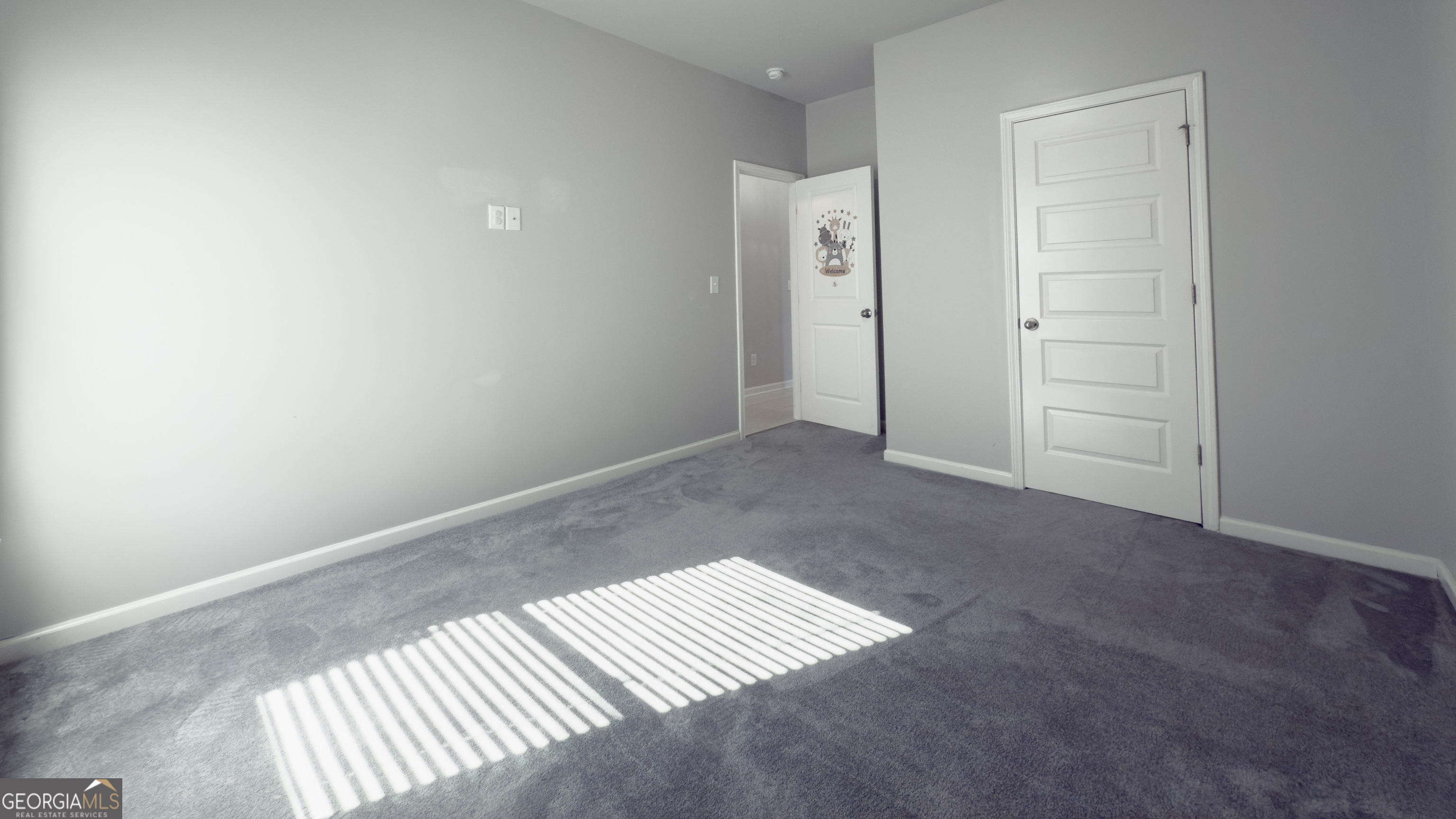 3368 Alhambra Circle Hampton, GA 30228 - Photo 27 of 43 an empty room with windows