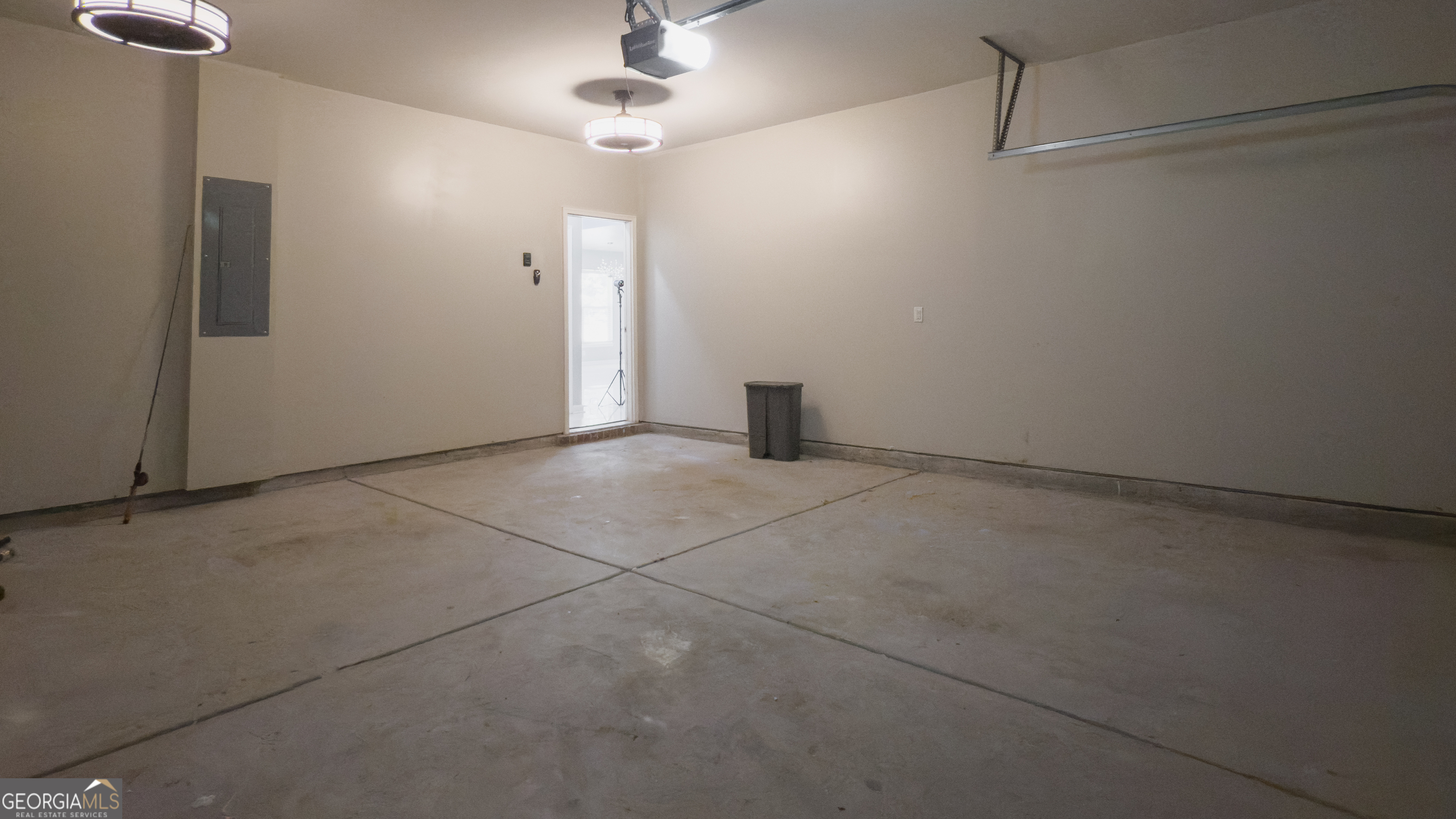 3368 Alhambra Circle Hampton, GA 30228 - Photo 43 of 43 a view of an empty room with a chandelier fan