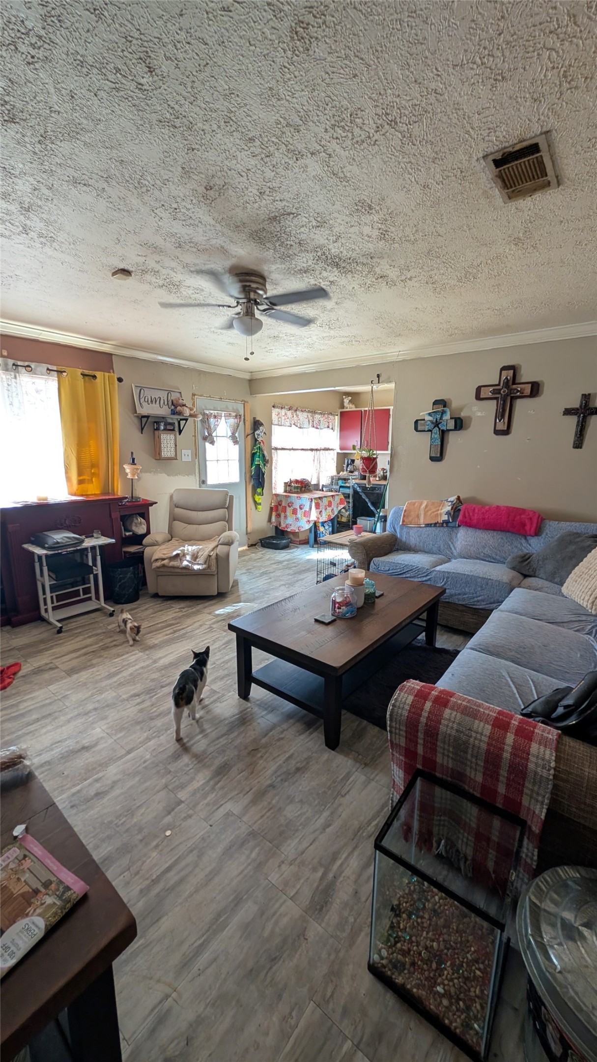 257 County Road 3669B Splendora, TX 77372 - Photo 7 of 14 a living room with furniture and a couch