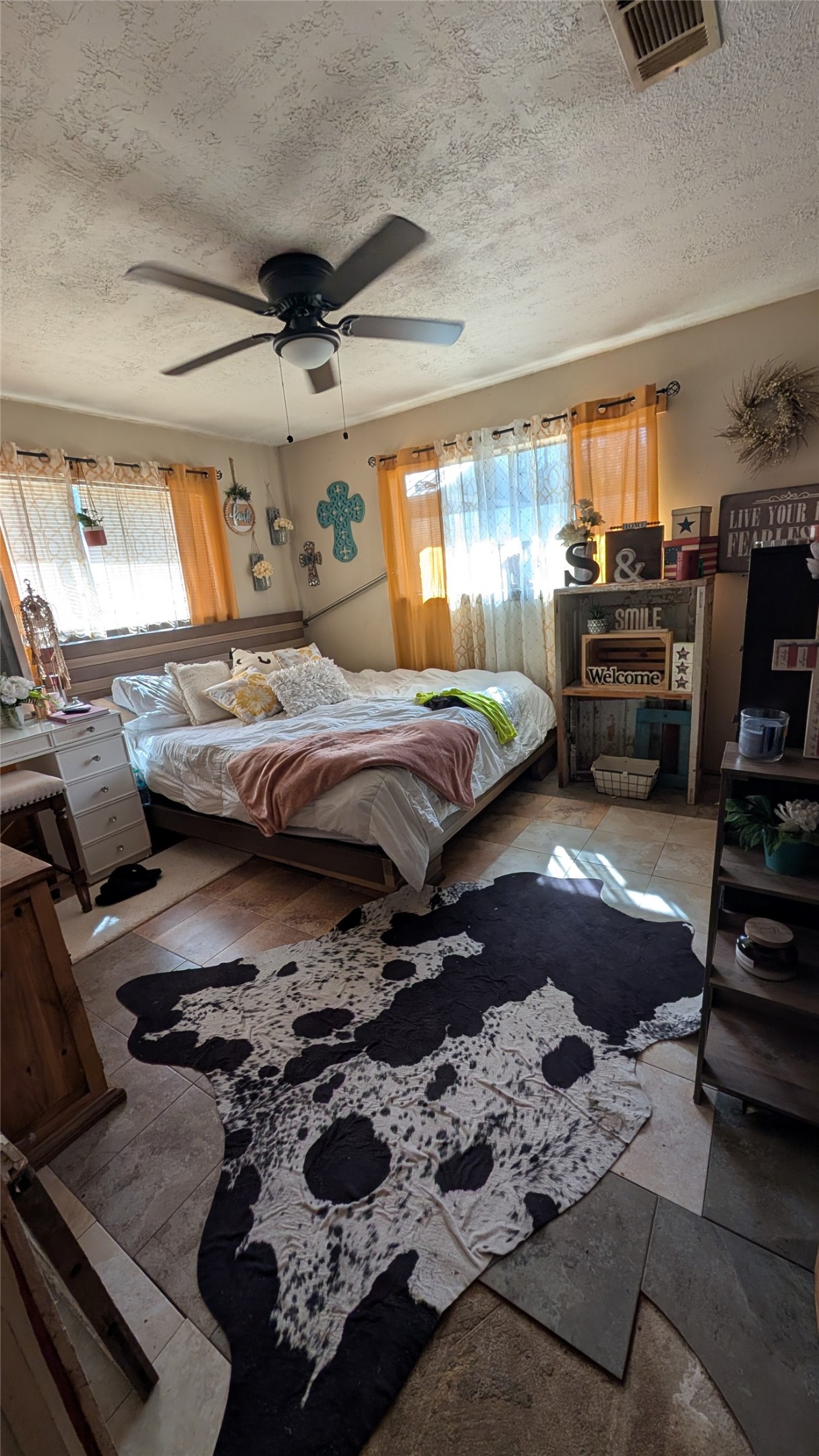 257 County Road 3669B Splendora, TX 77372 - Photo 9 of 14 a bedroom with bed and a window
