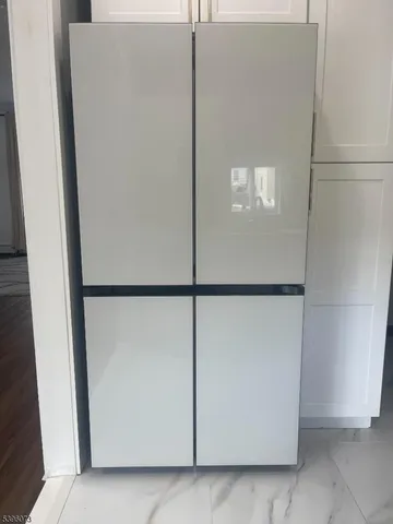 a close view of a refrigerator in kitchen