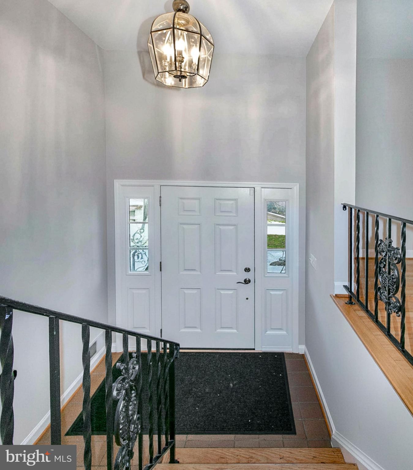 12415 Caisson Road Fairfax, VA 22030 - Photo 11 of 39 wooden floor with staircase