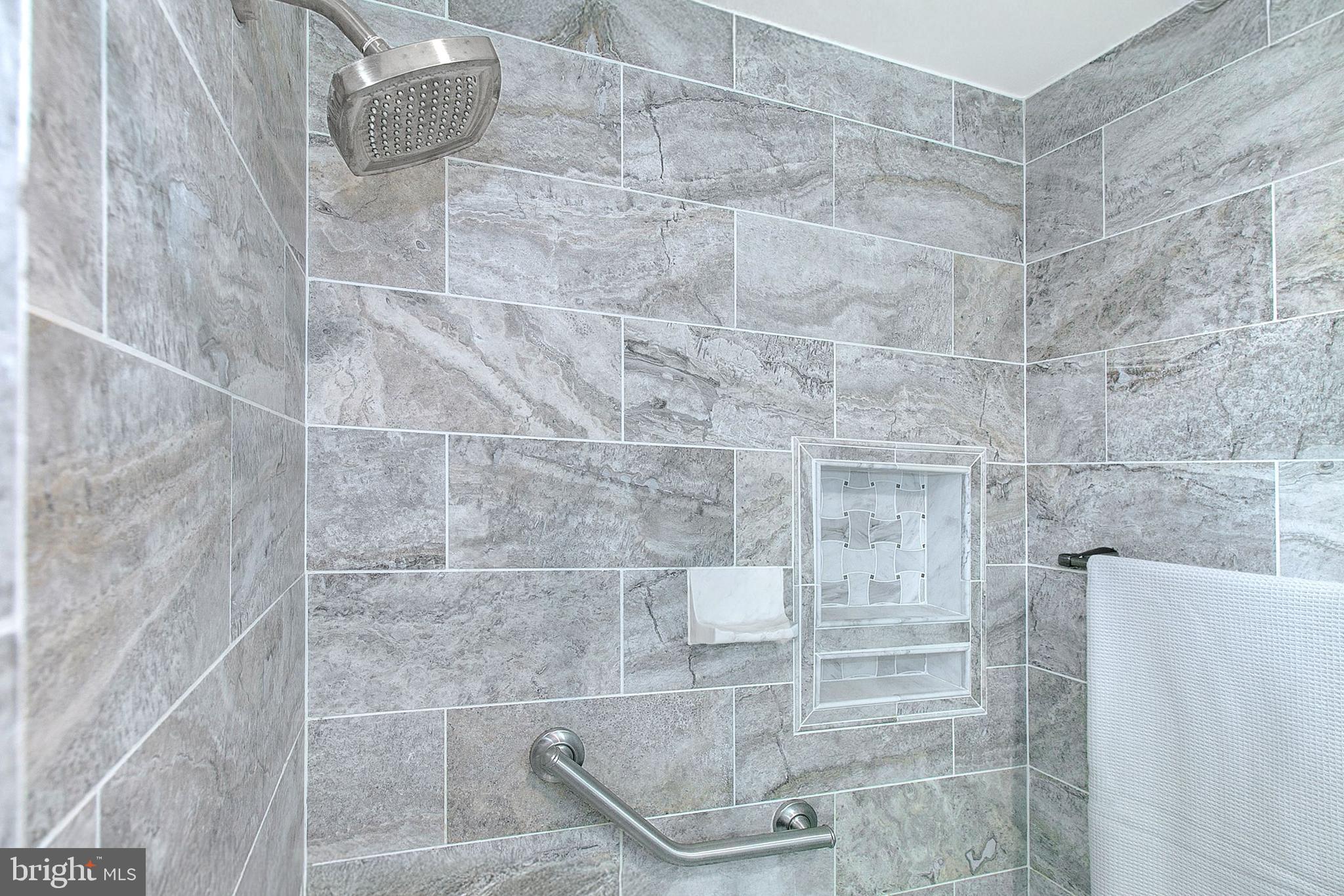 12415 Caisson Road Fairfax, VA 22030 - Photo 22 of 39 a bathroom with a shower