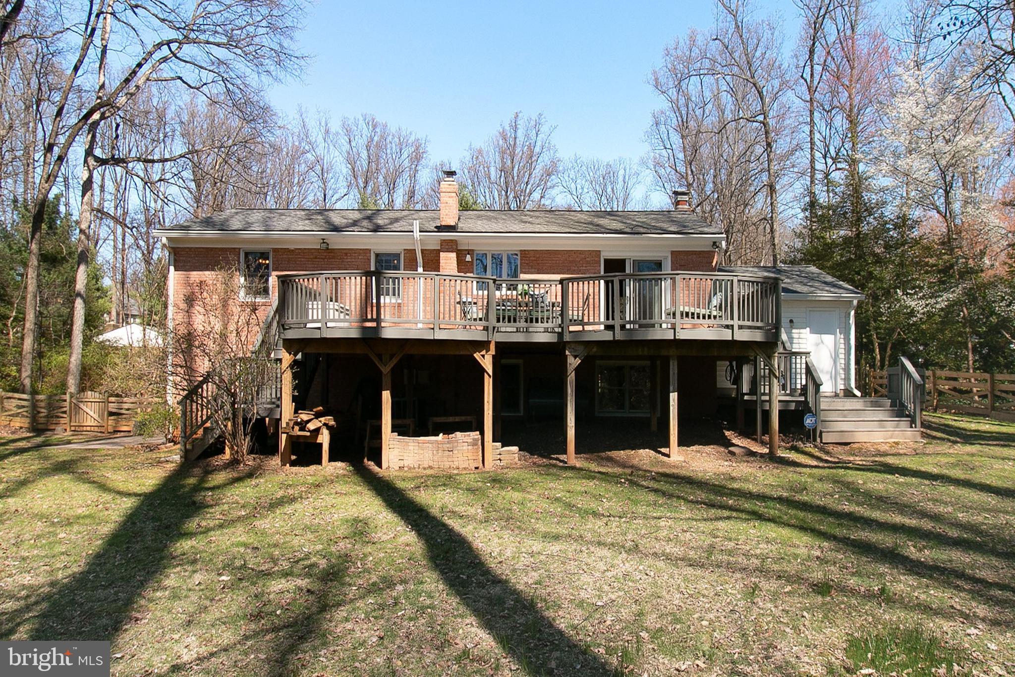 12415 Caisson Road Fairfax, VA 22030 - Photo 34 of 39 a view of a building with a patio