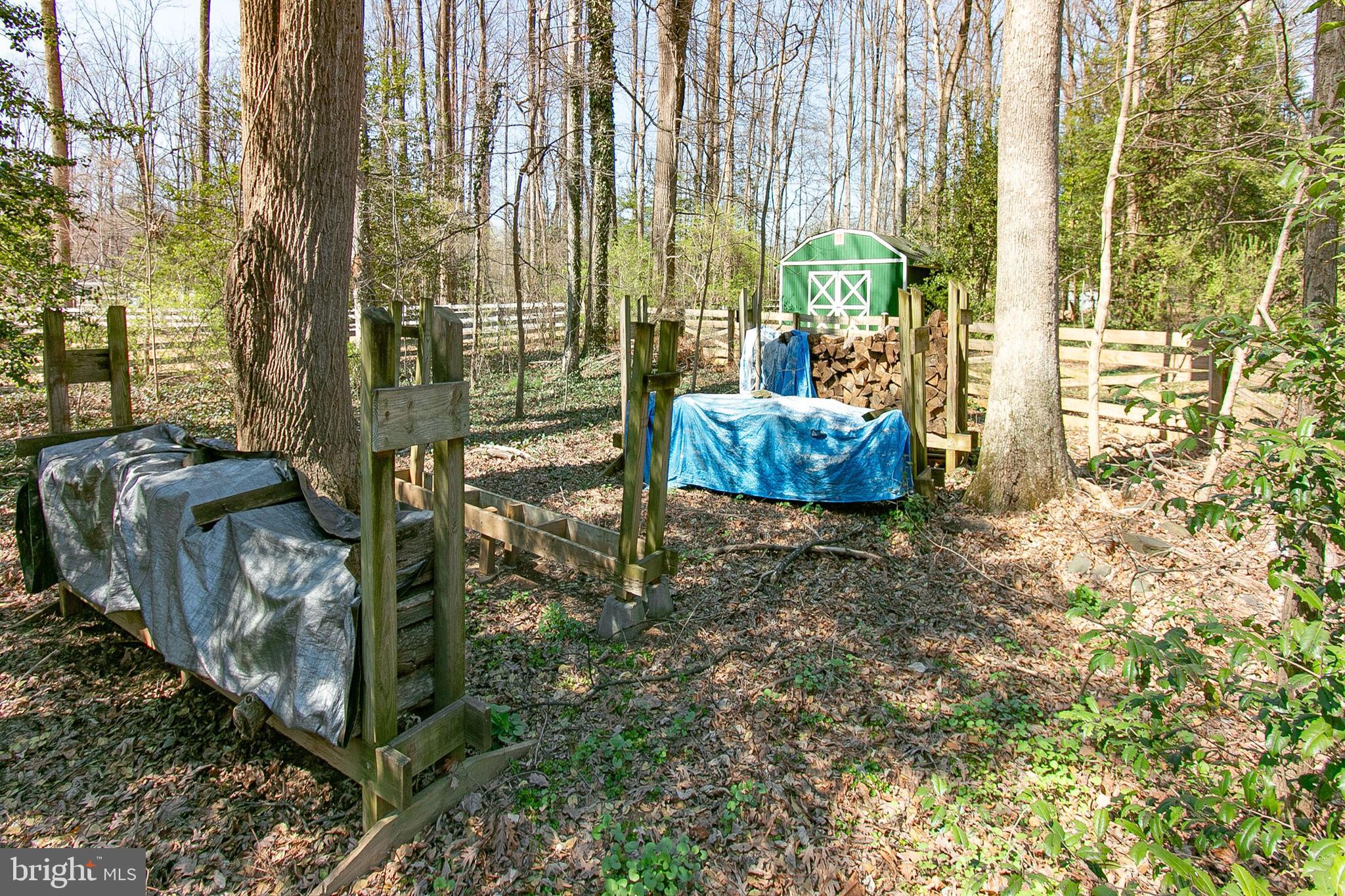 12415 Caisson Road Fairfax, VA 22030 - Photo 37 of 39 a backyard of a house with outdoor seating
