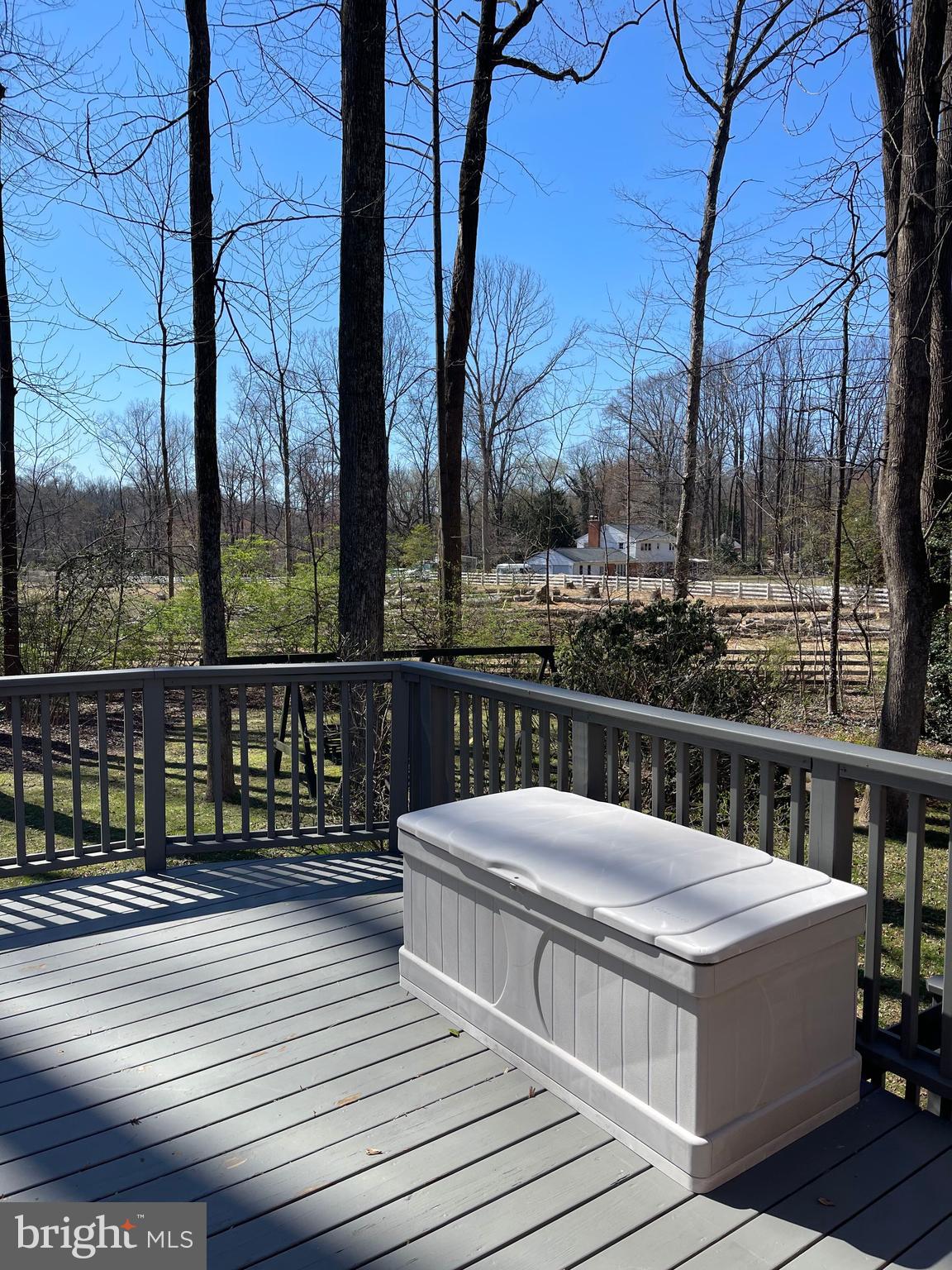 12415 Caisson Road Fairfax, VA 22030 - Photo 7 of 39 a view of a balcony with wooden floor and fence
