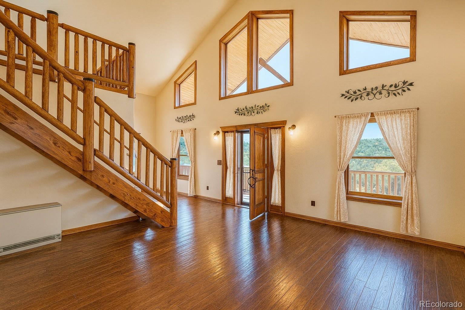 11799 County Road Trinidad, CO 81082 - Photo 8 of 45 a view of an entryway with wooden floor and windows