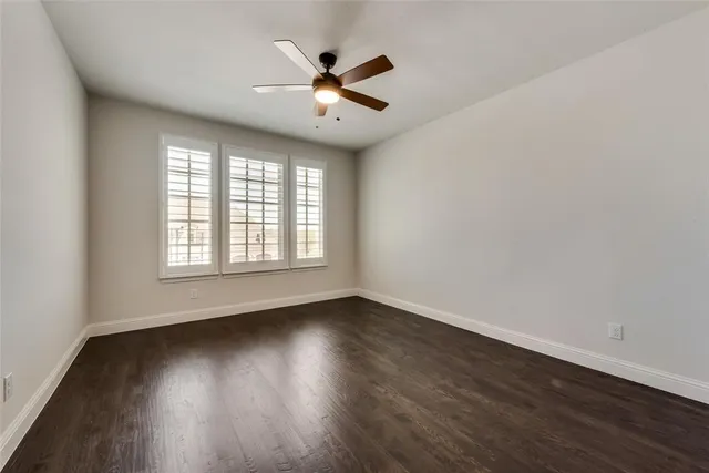 a view of a house with a fireplace and windows